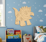 MDF DIY dinosaur wall decoration in a child's bedroom with books and toys.