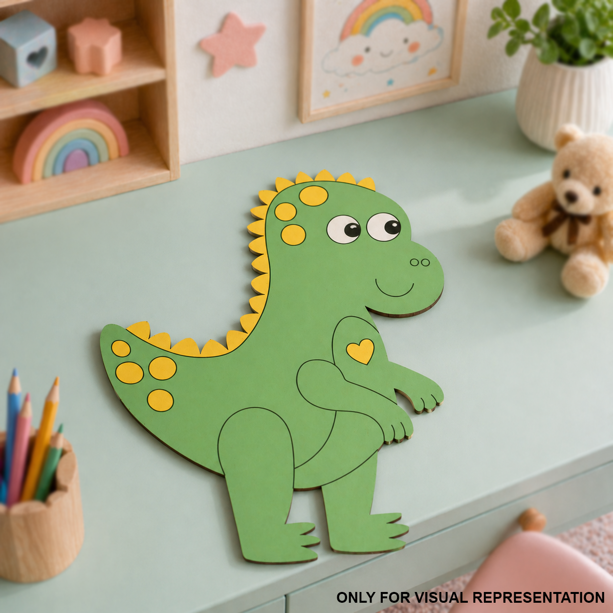 Colorful MDF DIY dinosaur craft on a light blue surface with stationery items.