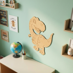 MDF DIY  dinosaur wall decoration in a child's room with shelves and a globe.