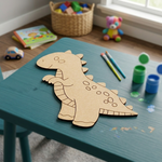 MDF DIY dinosaur cutout on a table with art supplies in a child's playroom.