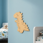MDF DIY  dinosaur wall decoration on a light blue wall in a child's room.