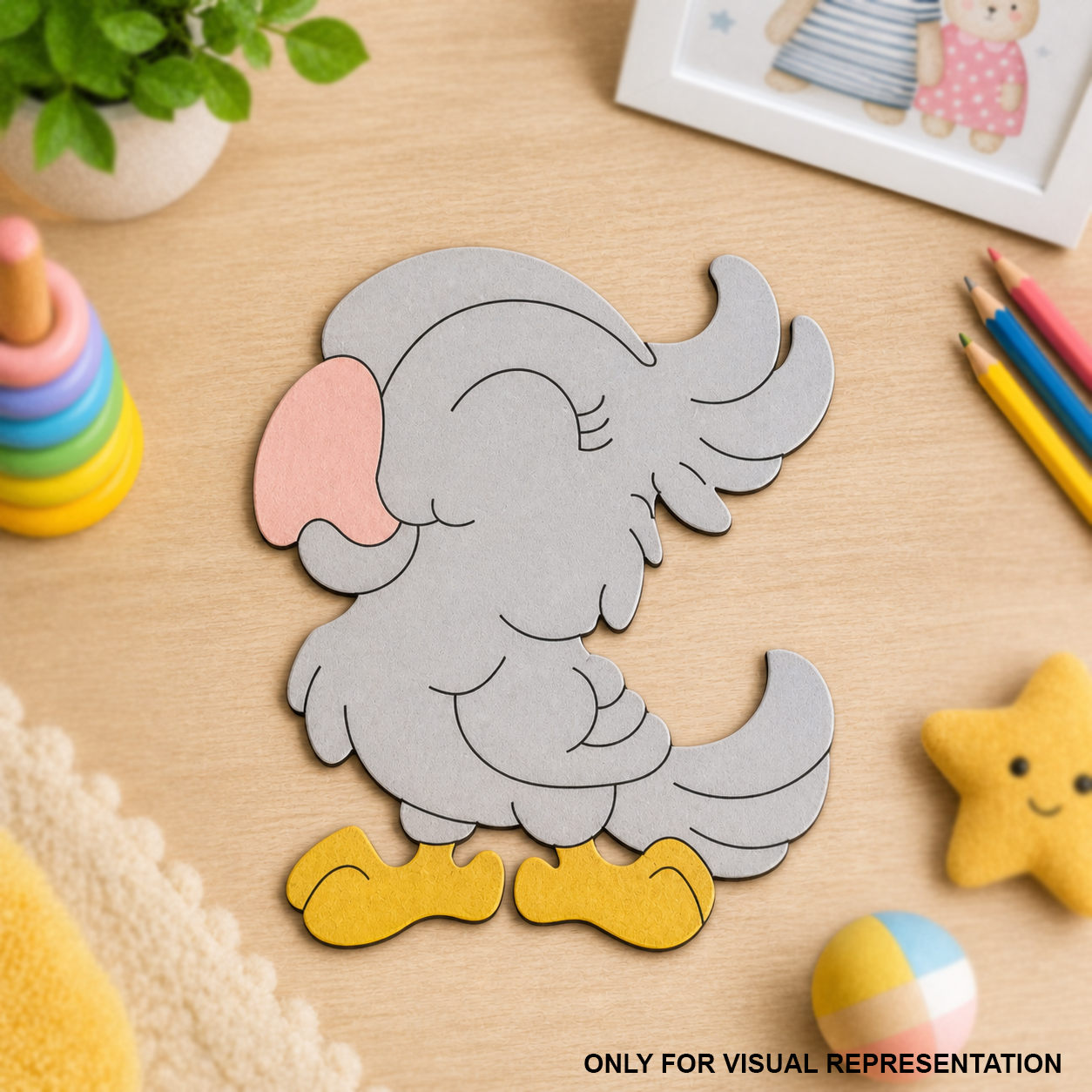 MDF DIY colored parrot cutout shaped like an elephant on a wooden surface with toys around