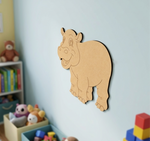 MDF DIY  hippo wall decoration in a child's room with toys and books.
