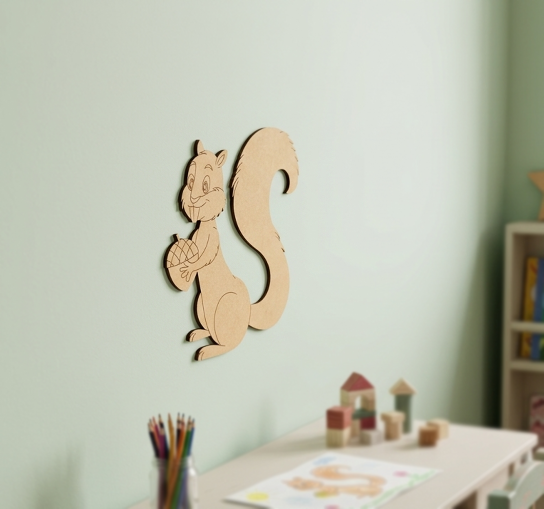 MDF DIY squirrel wall decoration on a light green wall with a child's desk and toys in the background.