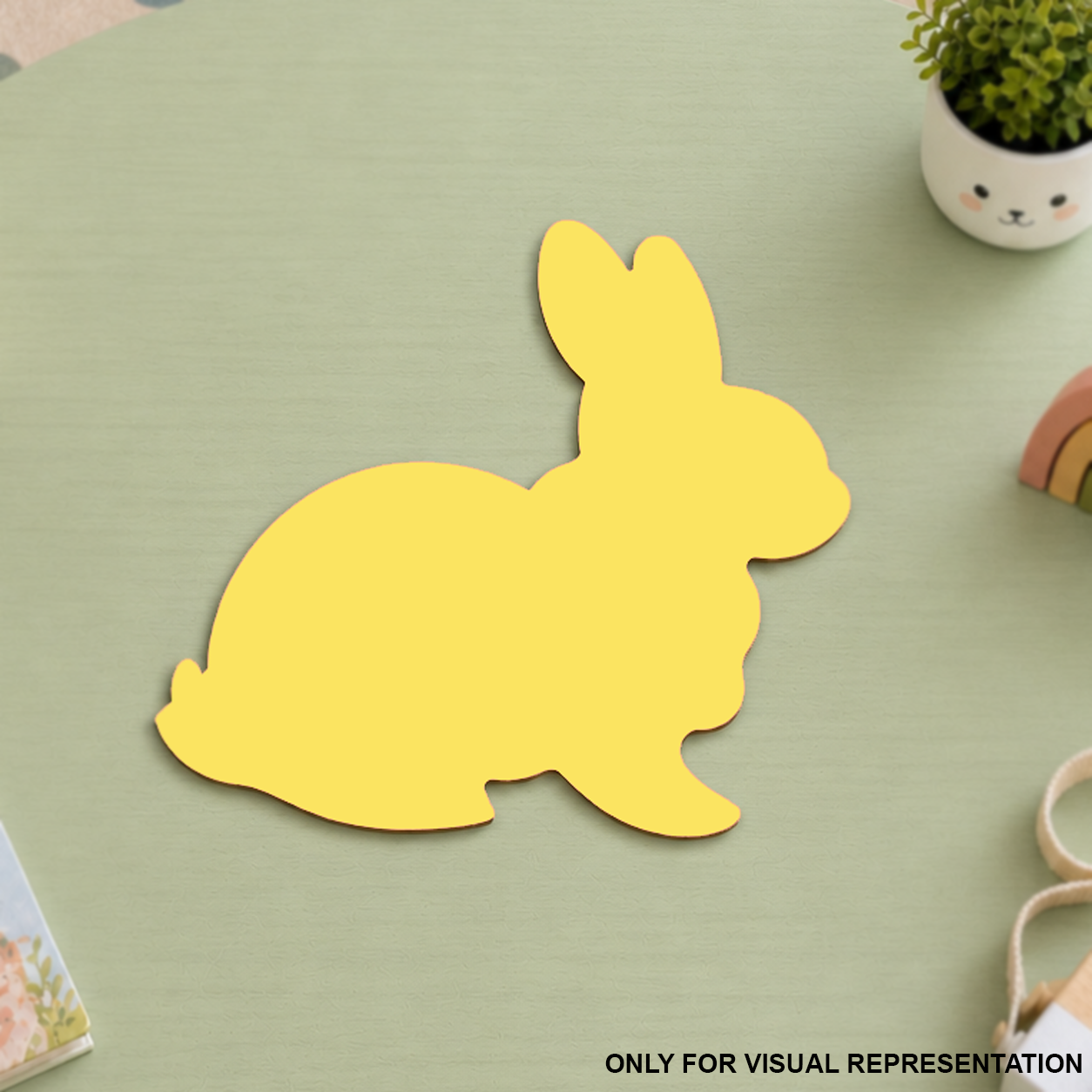   MDF DIY Yellow bunny-shaped placemat on a green surface with decorative elements.