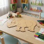 MDF DIY  rhino puzzle on a table with coloring supplies in a child's playroom.