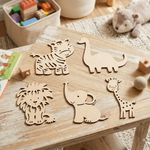 MDF DIY  animal cutouts on a wooden surface with toys in the background