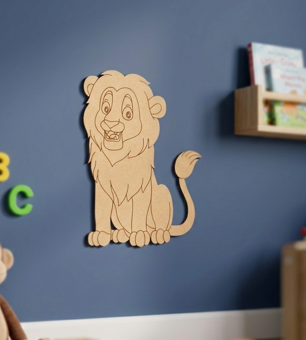 MDF DIY  lion cutout on a blue wall with alphabet letters and books in the background
