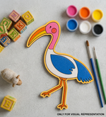 MDF DIY  cutout of a bird with painting supplies on a light surface