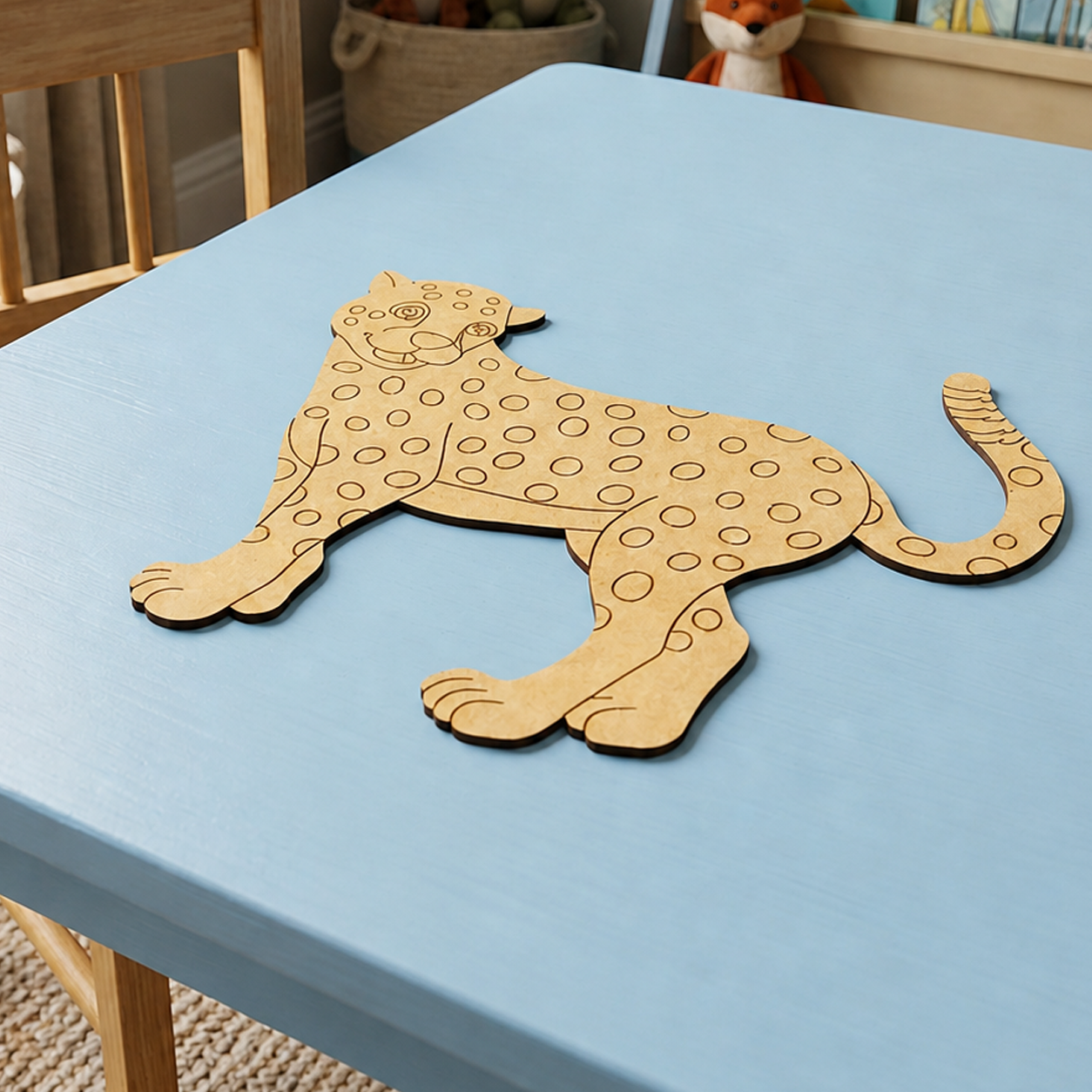 MDF DIY  cheetah puzzle on a blue table