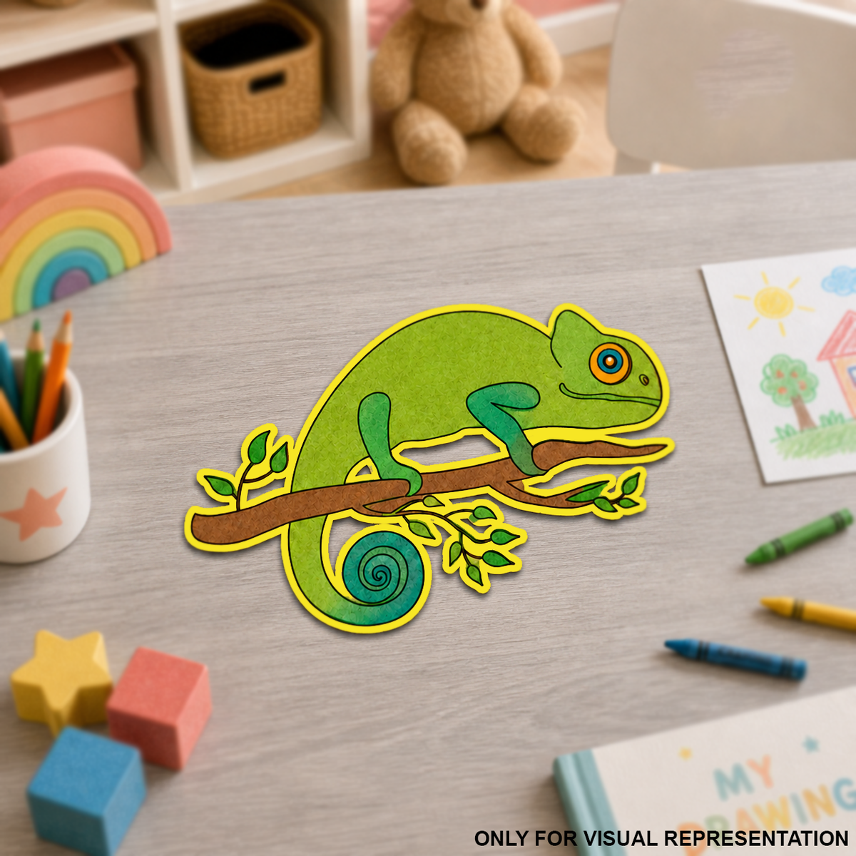 Colorful MDF DIY  cutout of a green lizard on a wooden table with children's toys and art supplies.