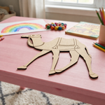 MDF DIY  camel model on a pink table with coloring supplies in the background