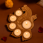 Decorative mdf candle holder with lit candles on a brown background