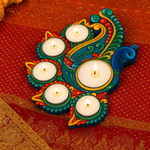 Decorative mdf candle holder with five candles on a patterned fabric background