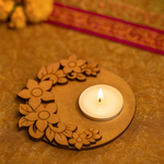 MDF tealight candle holder with a lit candle on a textured surface