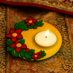 MDF tealight candle holder with flowers on a patterned fabric background