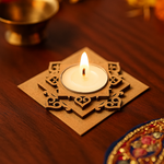 Decorative mdf candle holder with a lit candle on a wooden surface