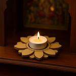 MDF DIY Candle in a decorative holder on a wooden surface with a blurred background.