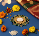 Decorative mdf candle holder with flowers and rice on a blue background