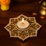 Decorative mdf candle holder with a lit candle on a dark background