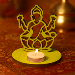 MDF Laxmi ji candle holder with a silhouette of a deity on a warm-toned fabric background