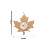 Leaf-shaped candle holder with a lit candle inside, shown with dimensions on a white background.
