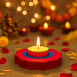 Decorative MDF candle holder in a red holder with blurred lights and decorations in the background