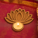 MDF tealight lotus-shaped candle holder with a lit candle on a red fabric background