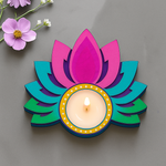 Decorative MDf tealight candle holder shaped like a lotus with a lit candle on a textured surface.
