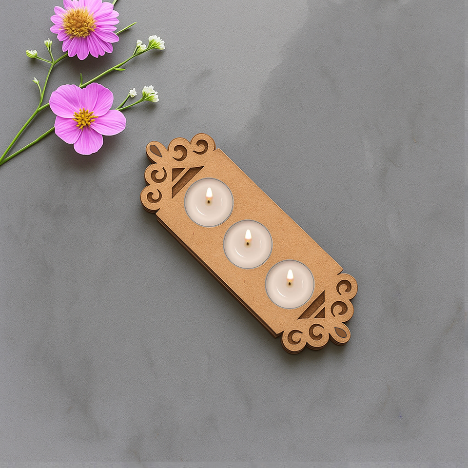Floral border MDF tealight candle holder with three lit candles for festive home decoration