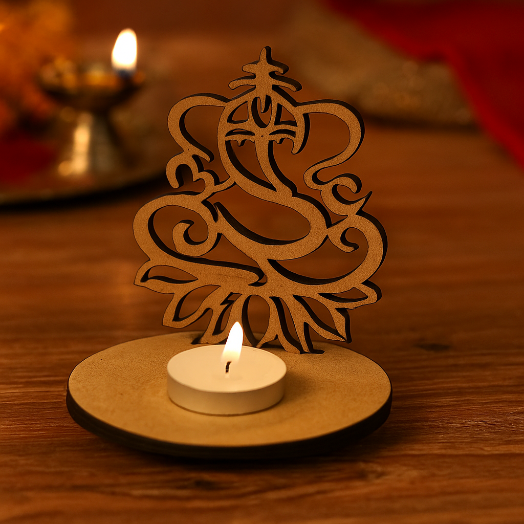 DIY MDF Ganesha figure with a lit candle on a wooden surface