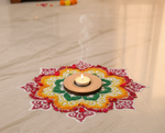 Decorative mdf candle holder with colorful design on a light surface