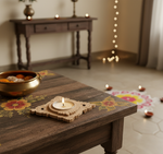 Decorative setup with a wooden table, candles, and a small shrine in a softly lit room with lit diy mdf tealight candle holder.