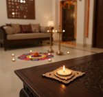 Decorative setup with candles and a colorful rangoli design in a living room with diy mdf tealight candle holder.
