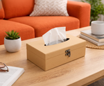 MDF DIY Tissue box on a coffee table with an orange couch and plant in the background