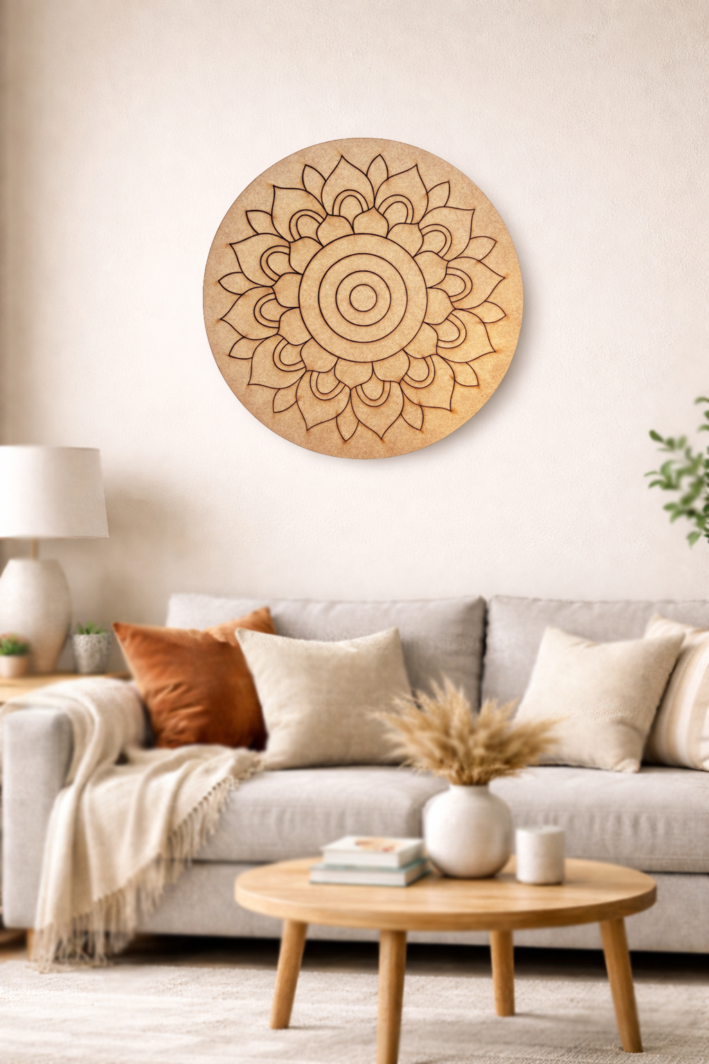 MDF DIY mandala wall art in a living room setting with a sofa and coffee table.