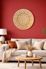 Living room with a MDF DIY mandala wall art piece on a red wall.