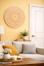 Living room with a beige sofa, decorative pillows, and a MDF DIY  mandala wall art piece.