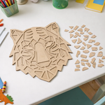 Unpainted DIY MDF tiger face geometric puzzle with detachable pieces for painting and craft activity show on craft table 