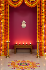 Natural MDF Kalash wall hanging with marigold garlands and diya backdrop