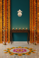  MDF Kalash cutout on teal wall with festive garlands and diyas"