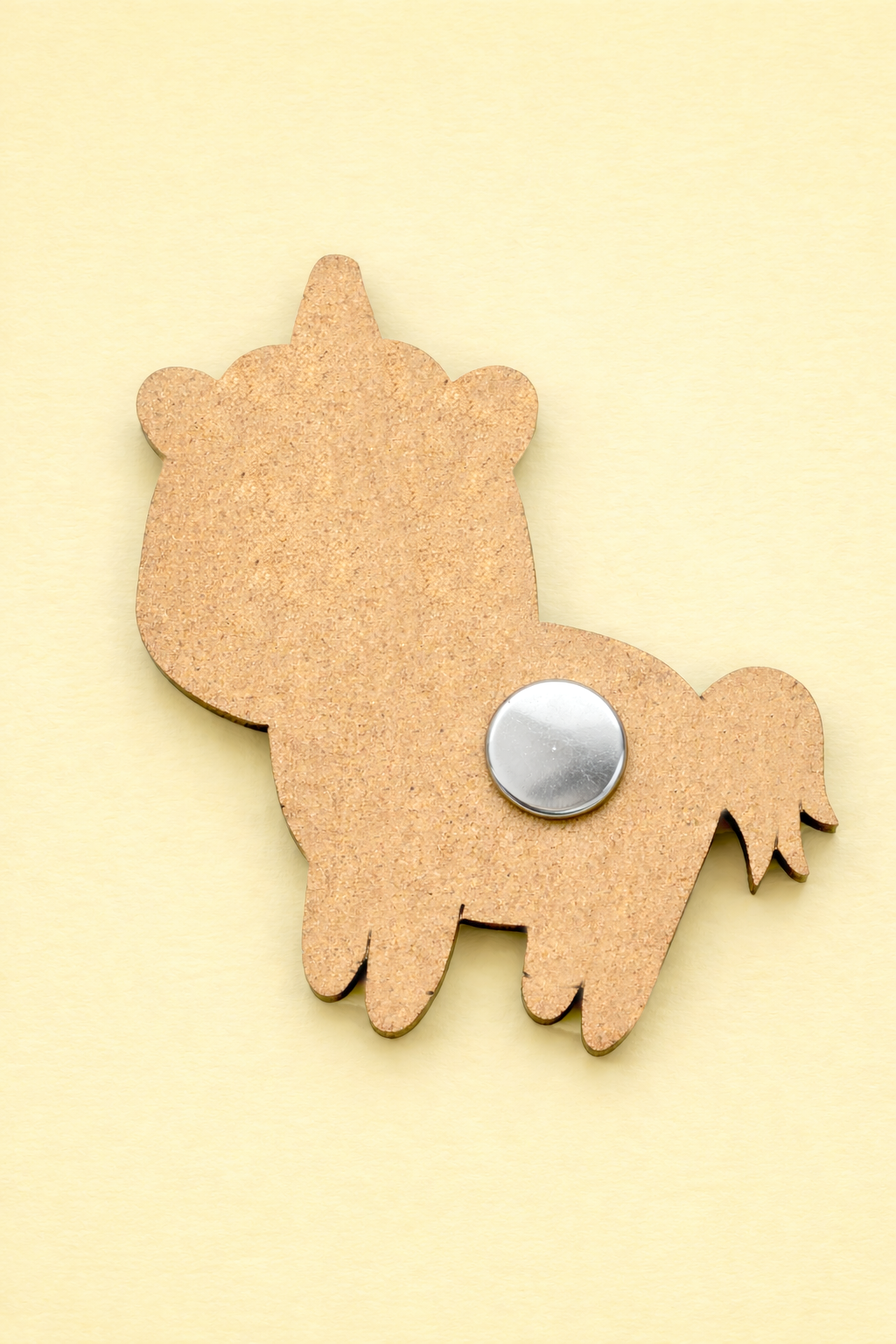 backside of MDF unicorn DIY fridge magnet unpainted craft cutout for home decor