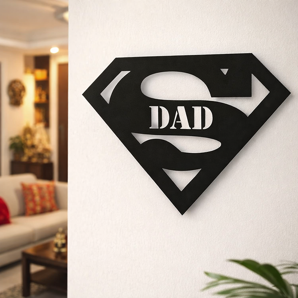 Black superhero-style “Super Dad” wall décor mounted on a white wall in a modern living room interior.