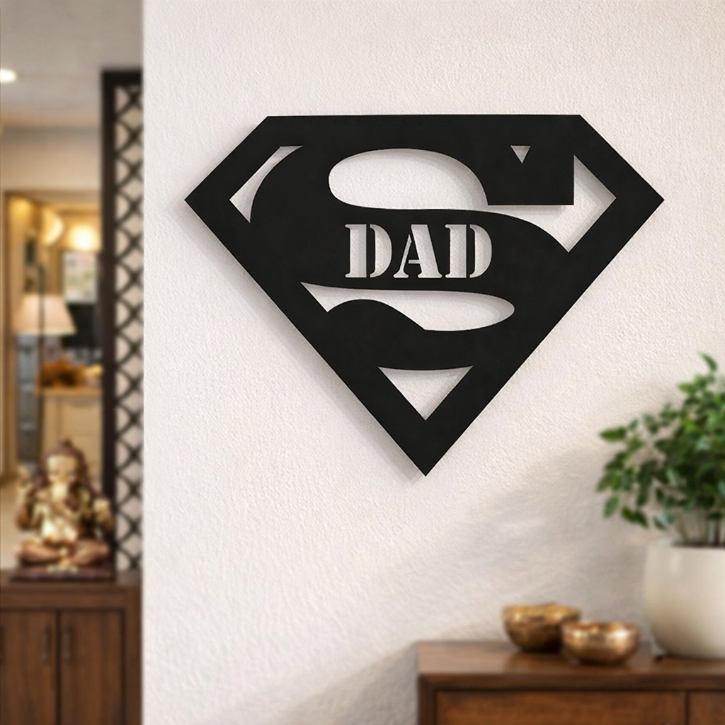 Black superhero-style “Super Dad” wall décor mounted on a white wall in a modern living room interior.