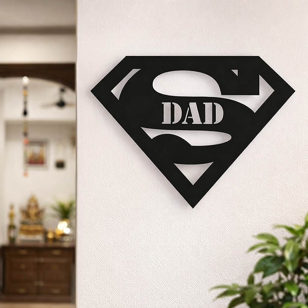 Black superhero-style “Super Dad” wall décor mounted on a white wall in a modern living room interior.