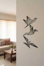 Origami birds MDF wall decor set with geometric bird designs mounted on a neutral wall in a modern home interior.