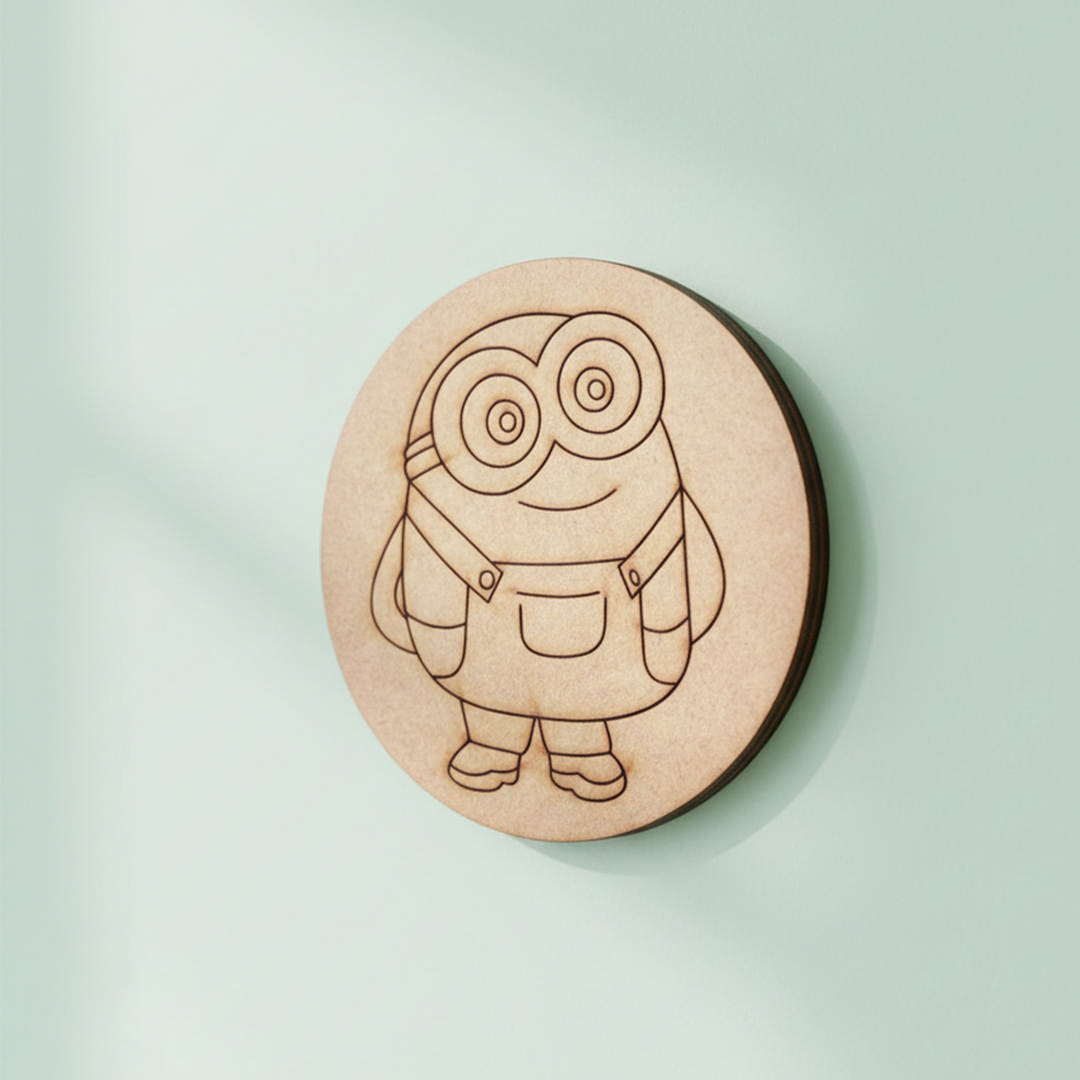 Round MDF pre-marked base with Minion-inspired cartoon character painted in yellow and blue for kids craft.