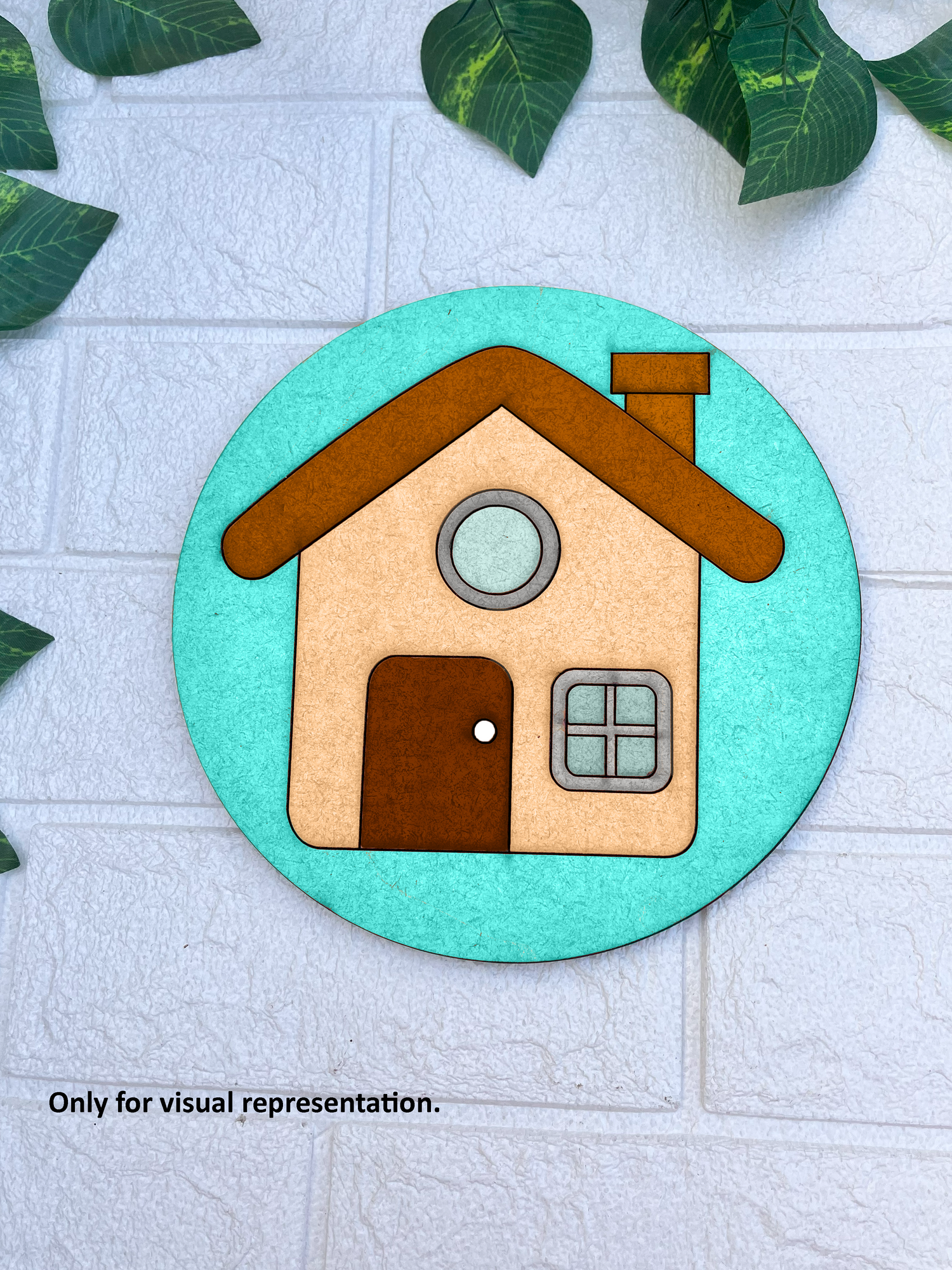 Colored MDF round base with pre-marked house design, painted for kids’ craft activity.