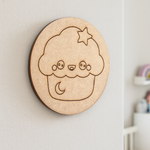 Unpainted round MDF pre-marked cupcake base with star and moon design for DIY kids painting and craft.