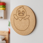 Unpainted round MDF pre-marked chick in egg base for DIY kids painting and craft.